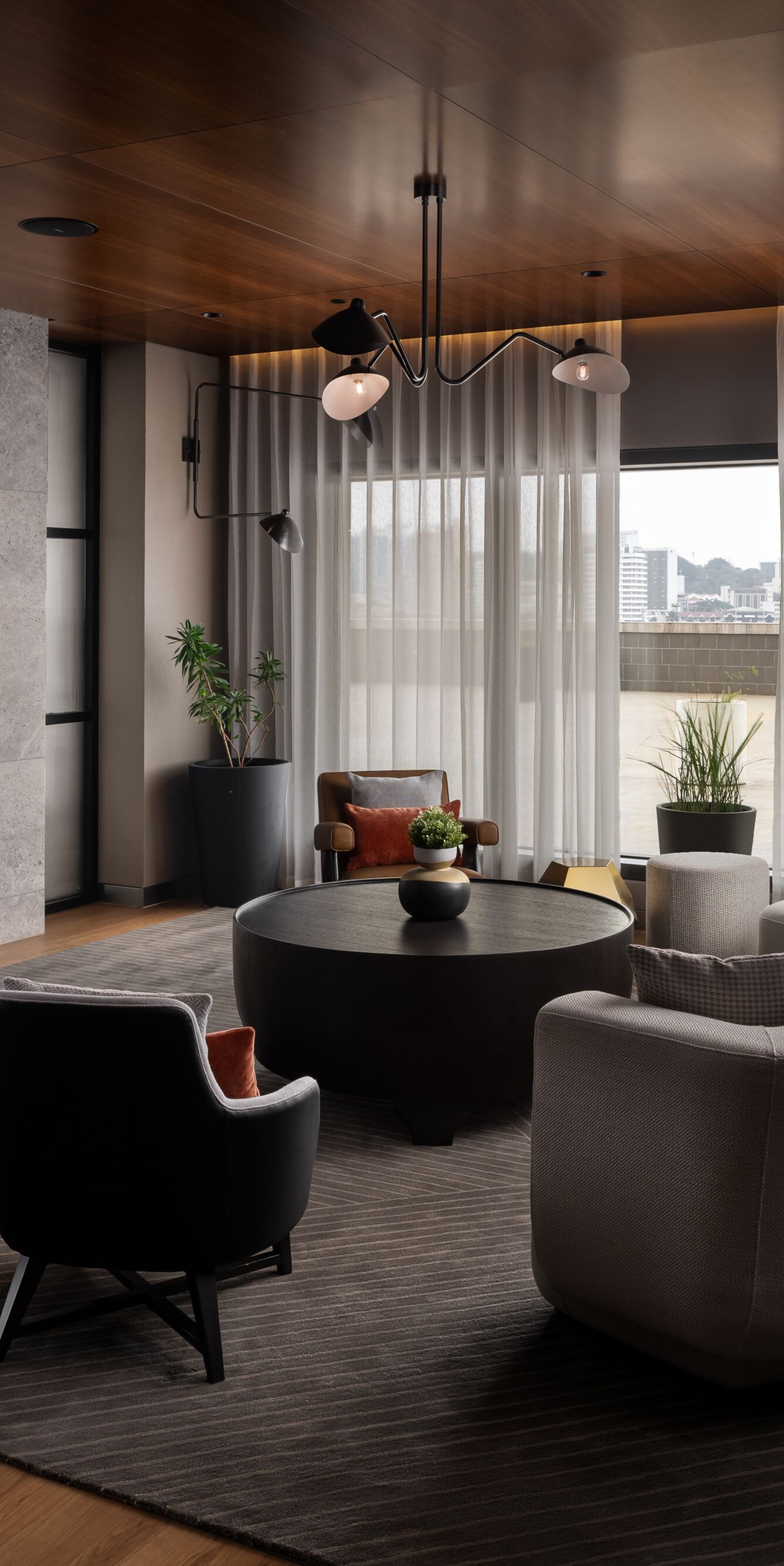 Lounge with fireplace and city view
