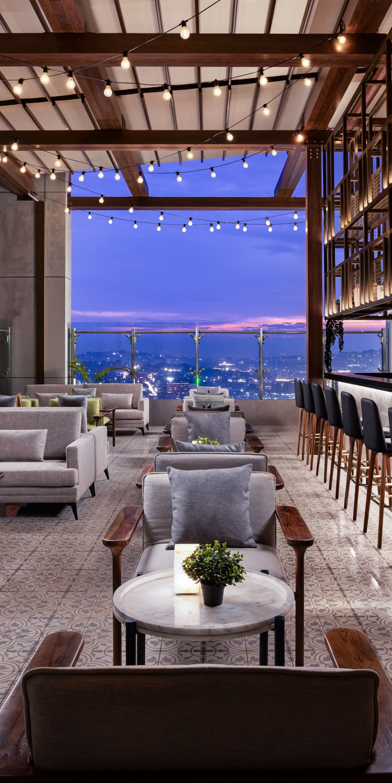 Rooftop bar with city views and seating