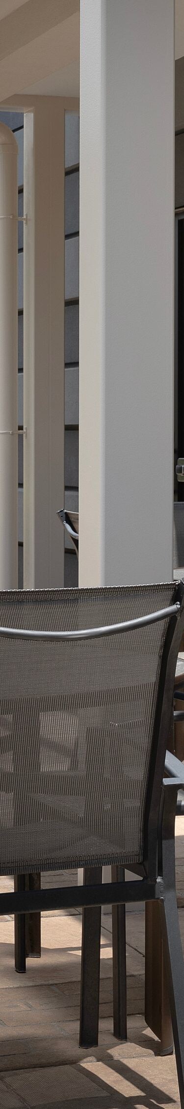 Outdoor hotel patio with seating