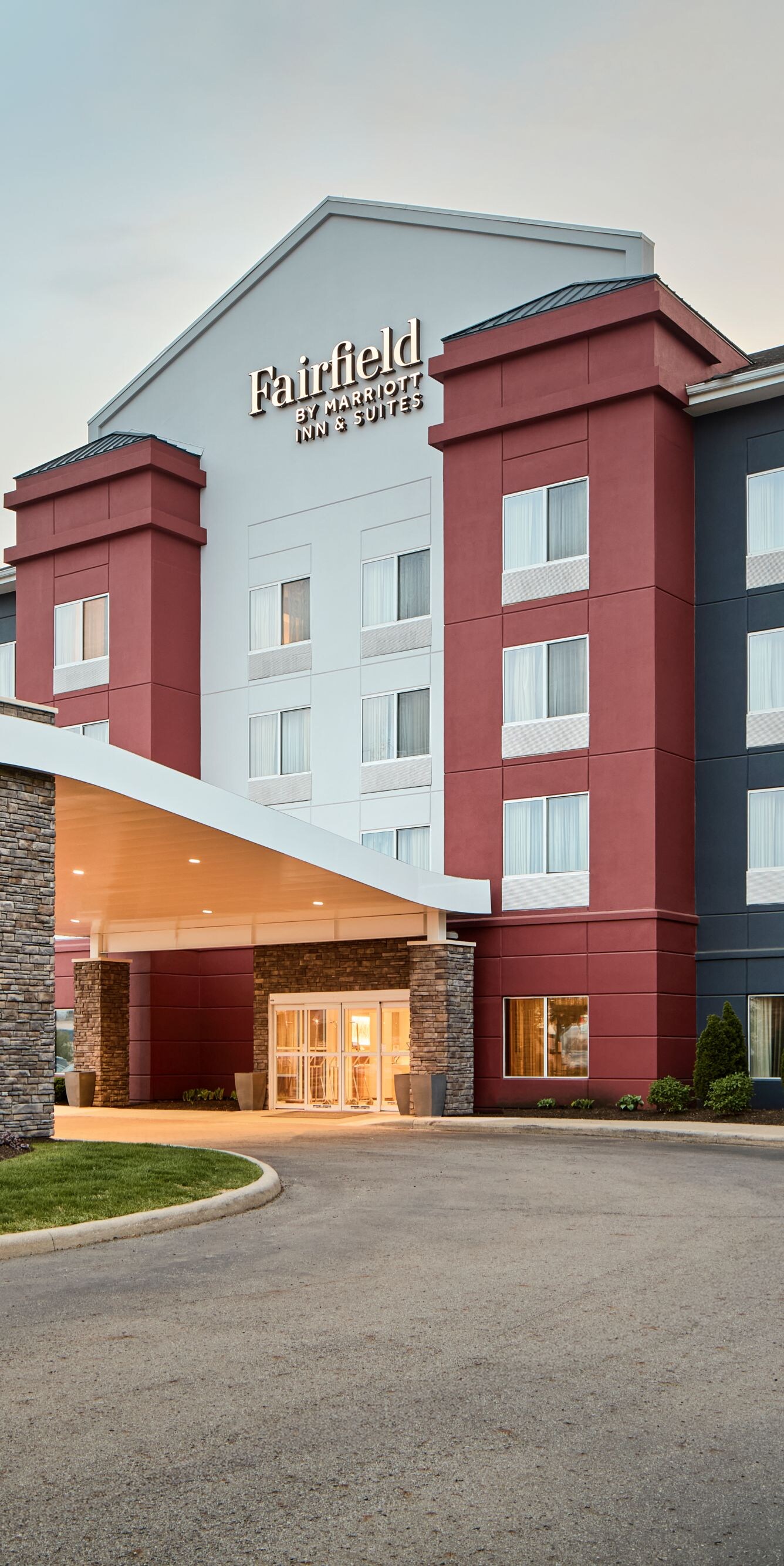 Fairfield Inn & Suites hotel entrance at dusk