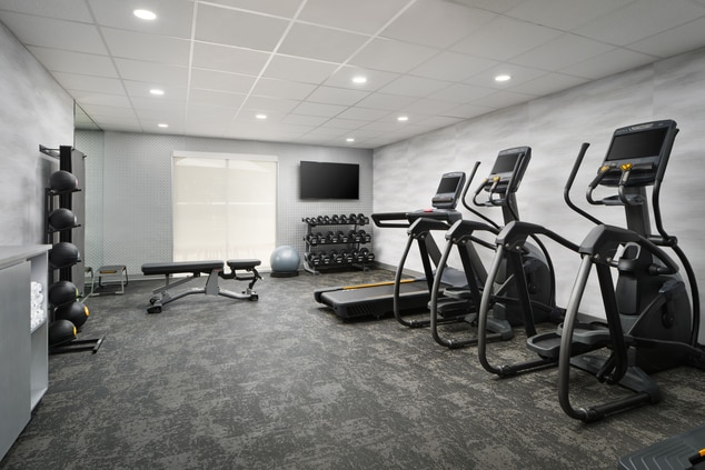 Hotel fitness center with multiple cardio machines