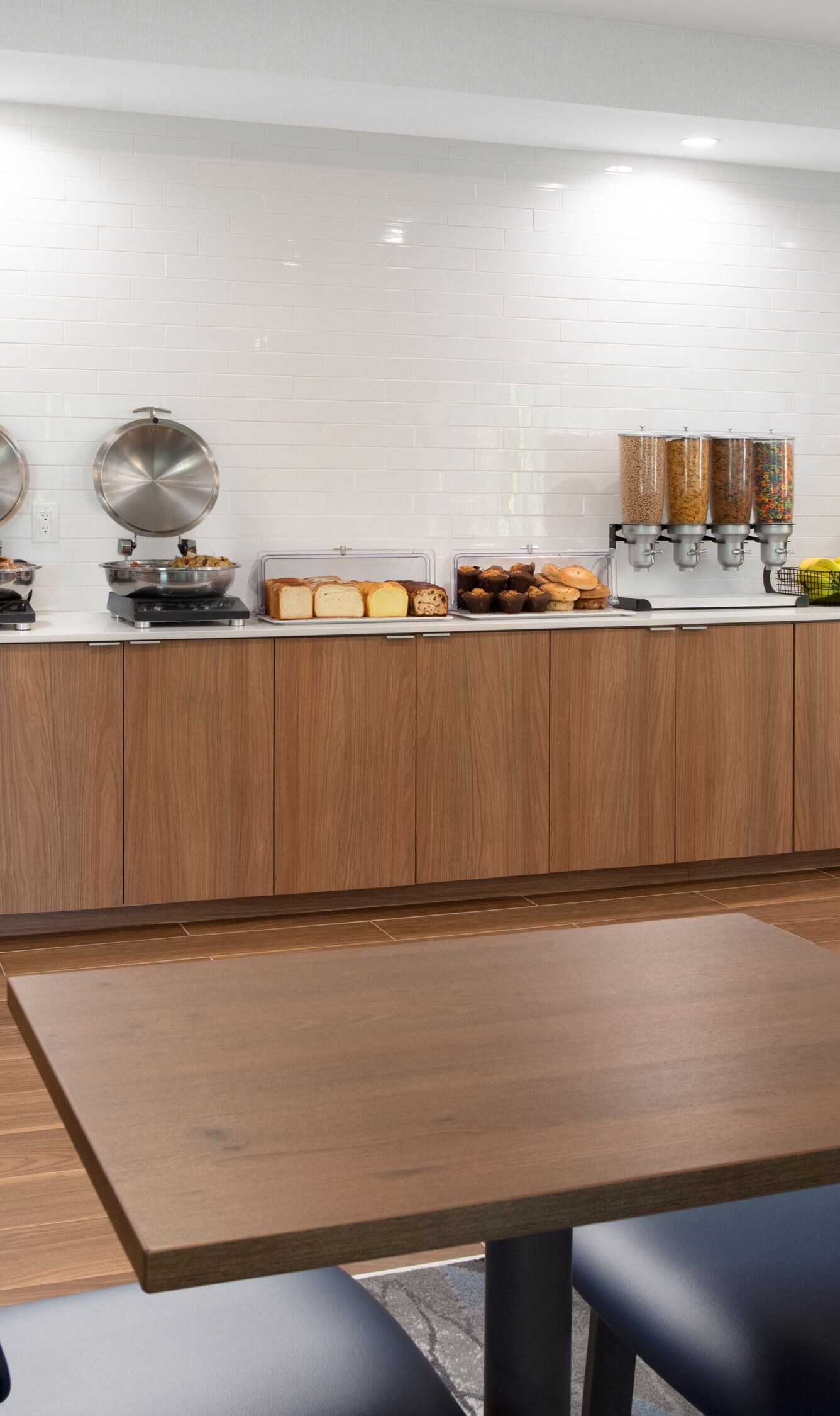 Hotel breakfast buffet with counters and hot food