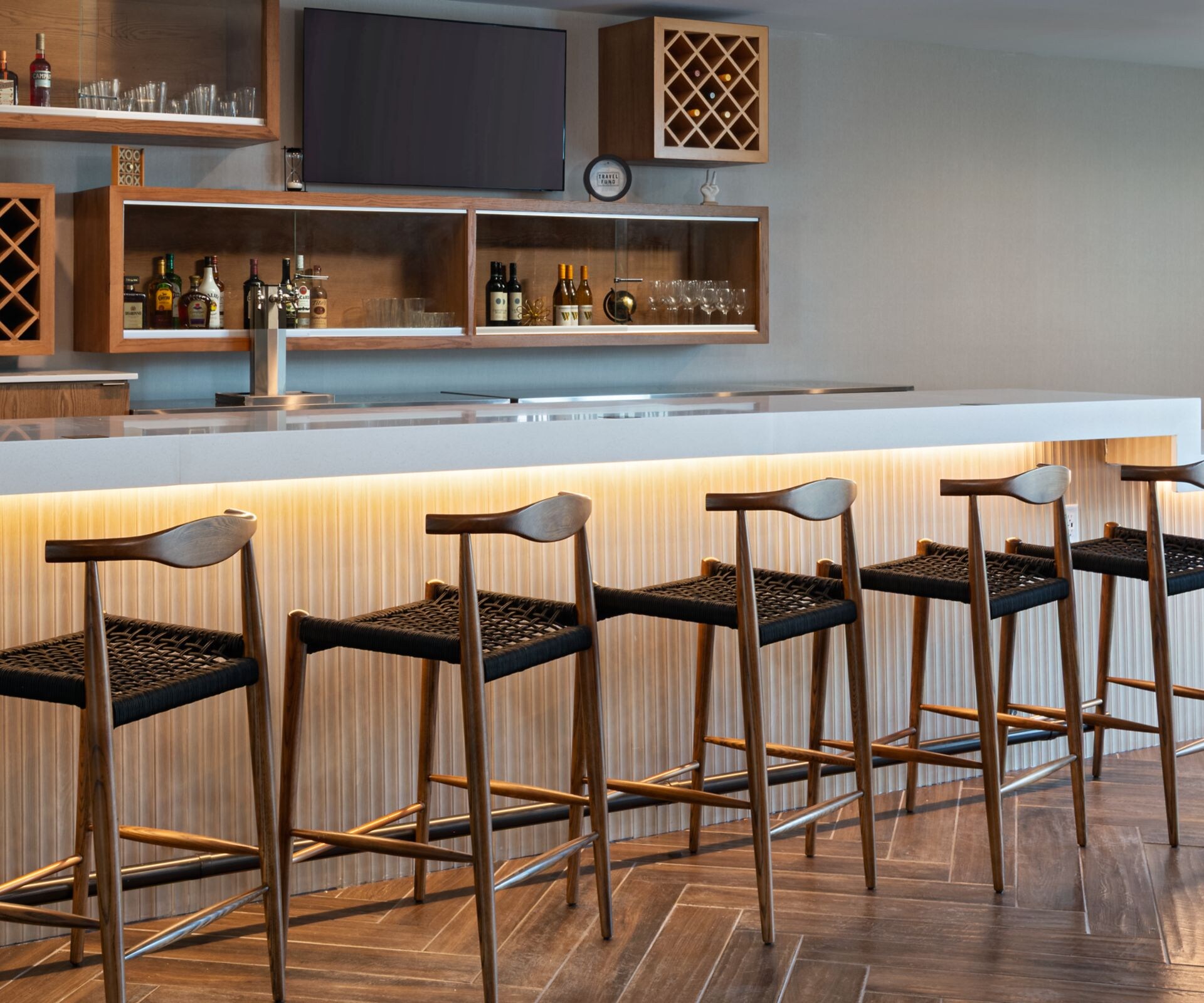 Long bar with barstools