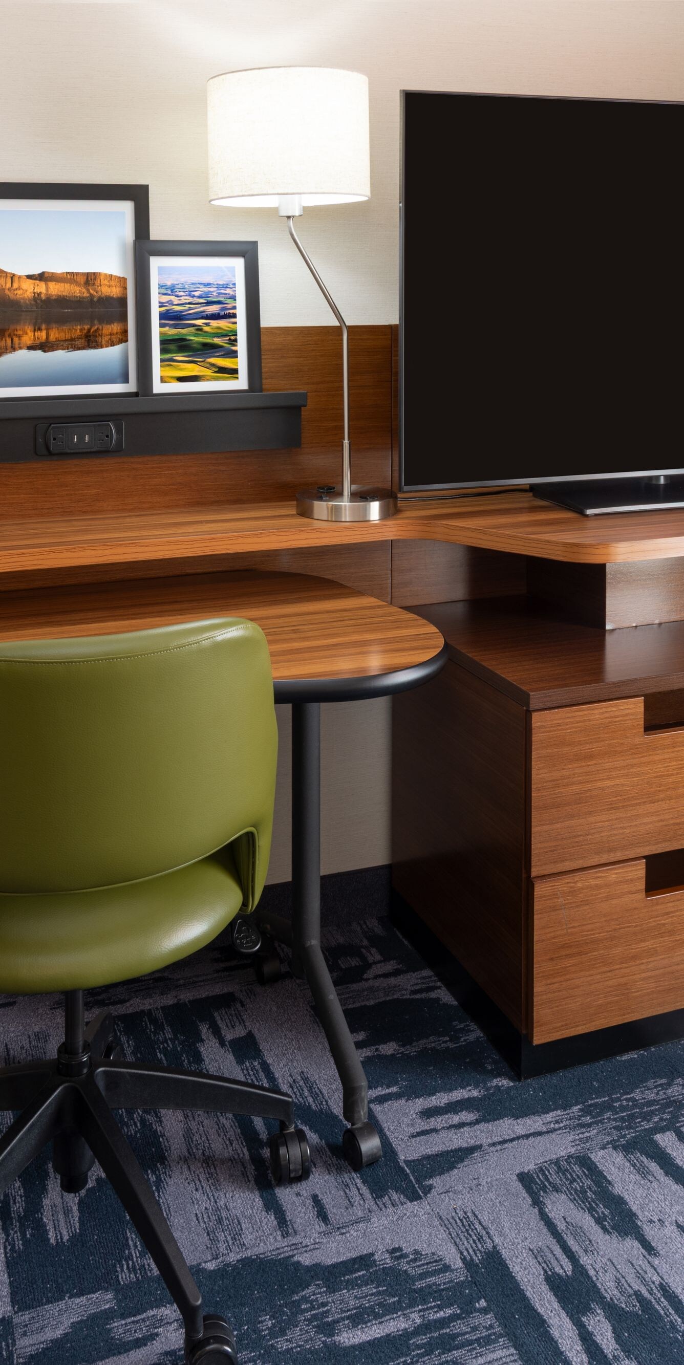 Guest room with desk and workspace area