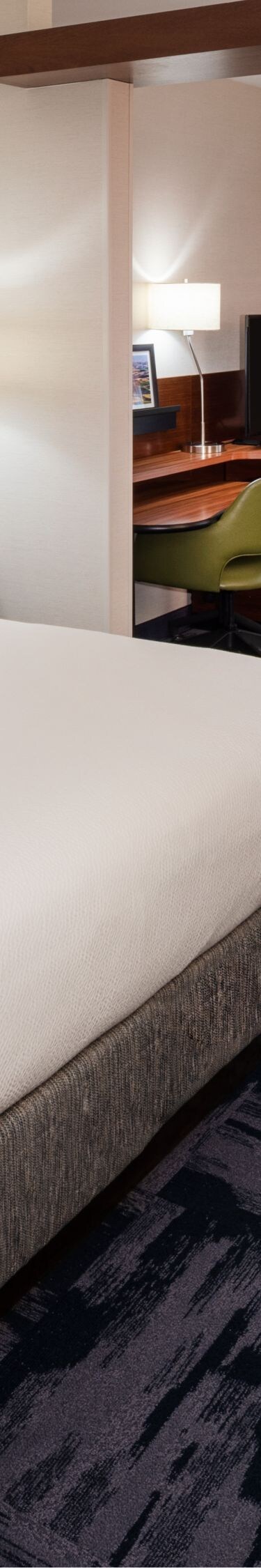 King Suite with pull-out sofa made up for sleeping