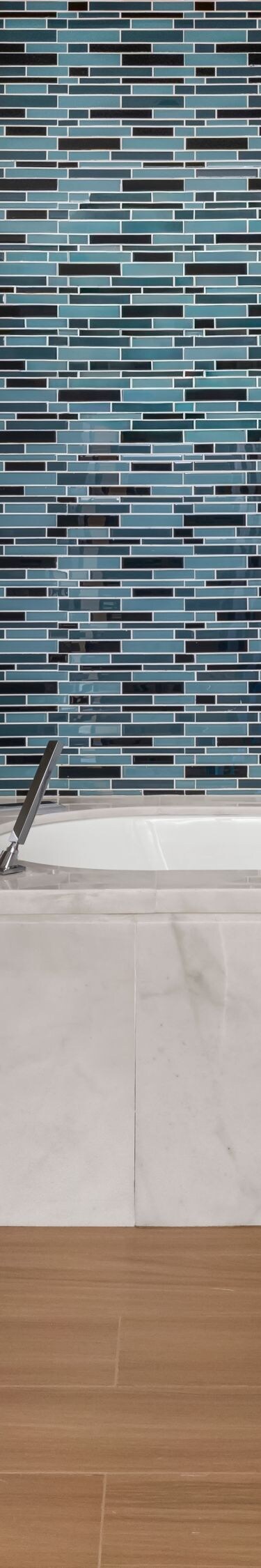 Suite bathroom with double vanity and bathtub