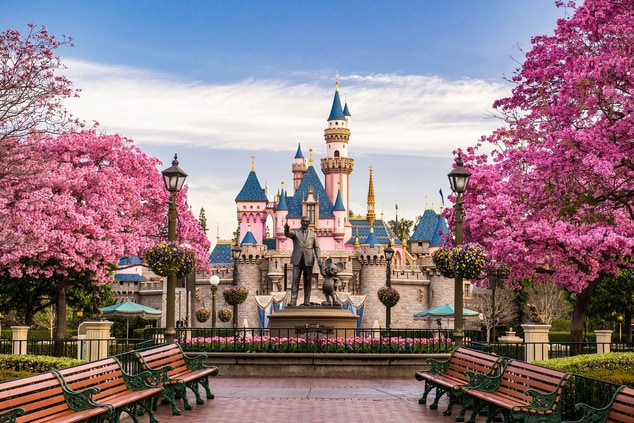 Picturesque photo of Disney's castle and statue