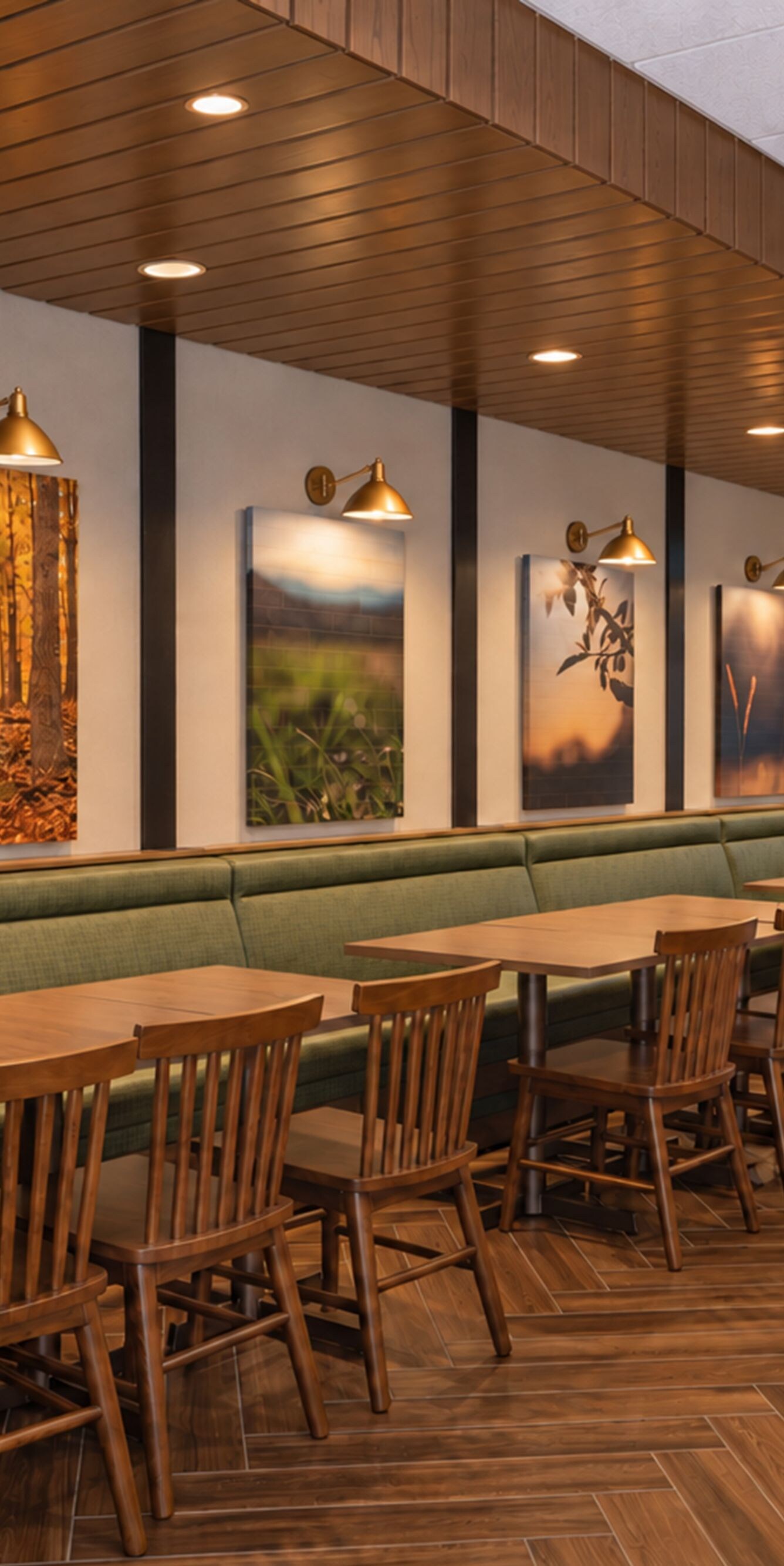 Restaurant seating with green banquette