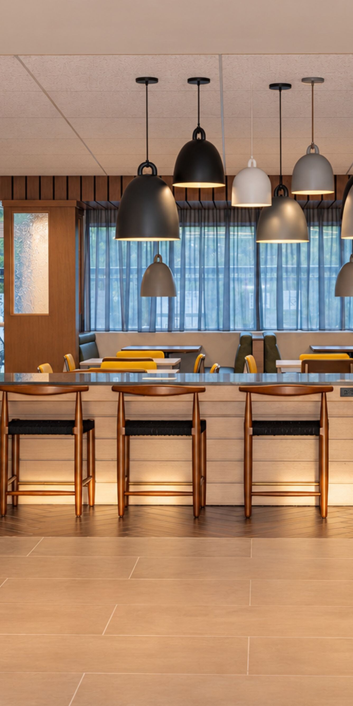 lobby with bar seating and lighting