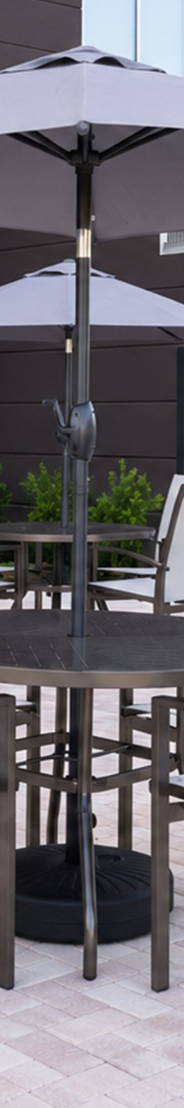 Outdoor patio with tables and umbrellas
