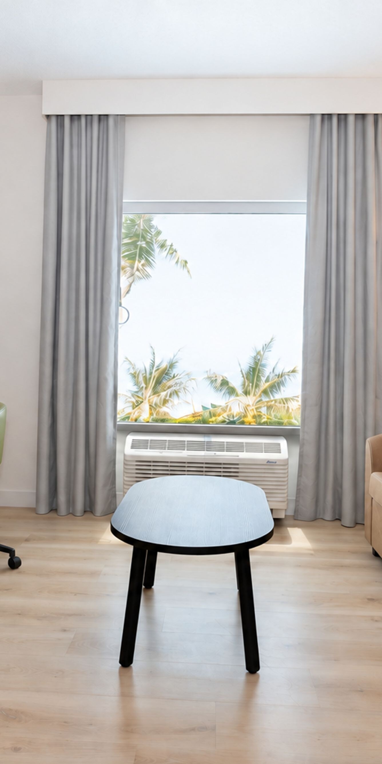 Guest room with sofa and work desk