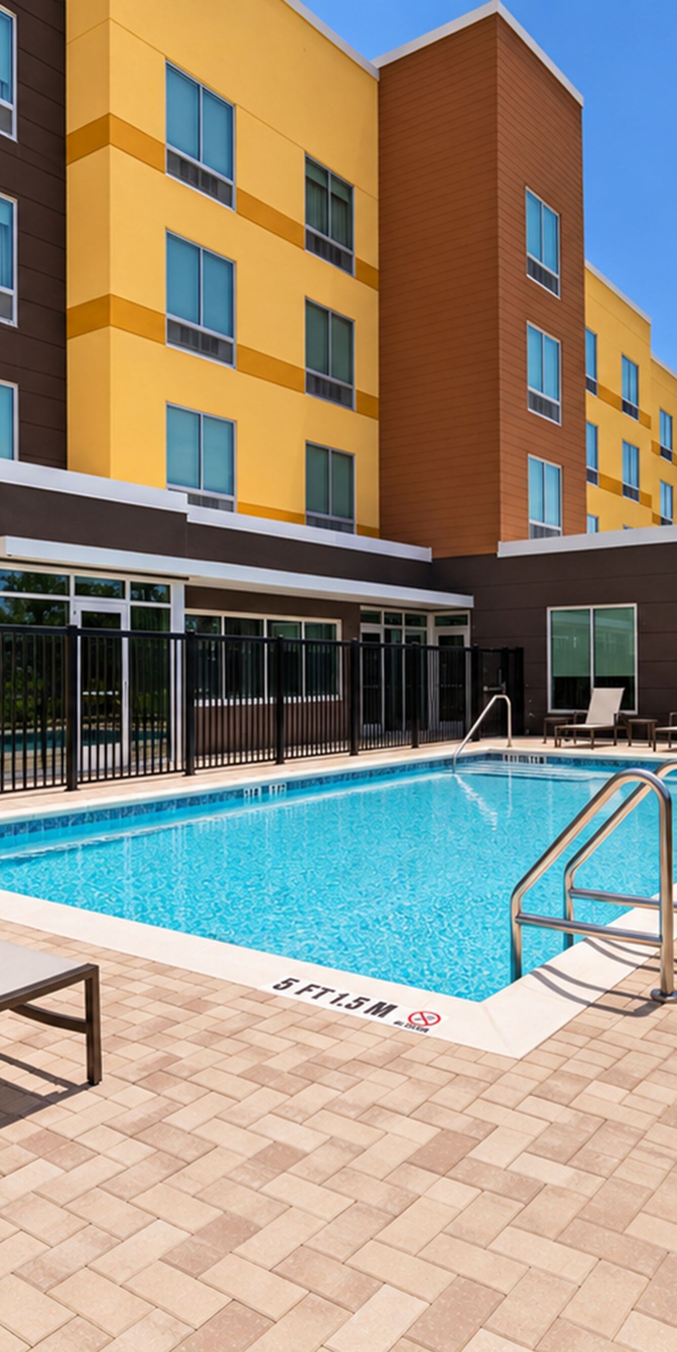 outdoor swimming pool and sun loungers