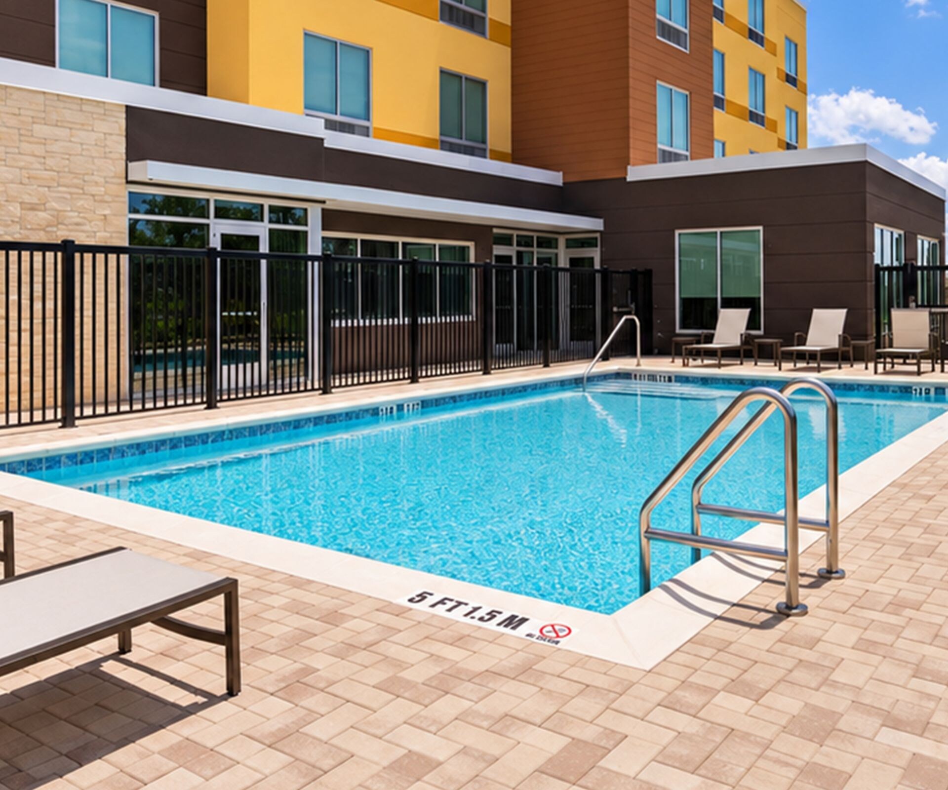 outdoor swimming pool and sun loungers