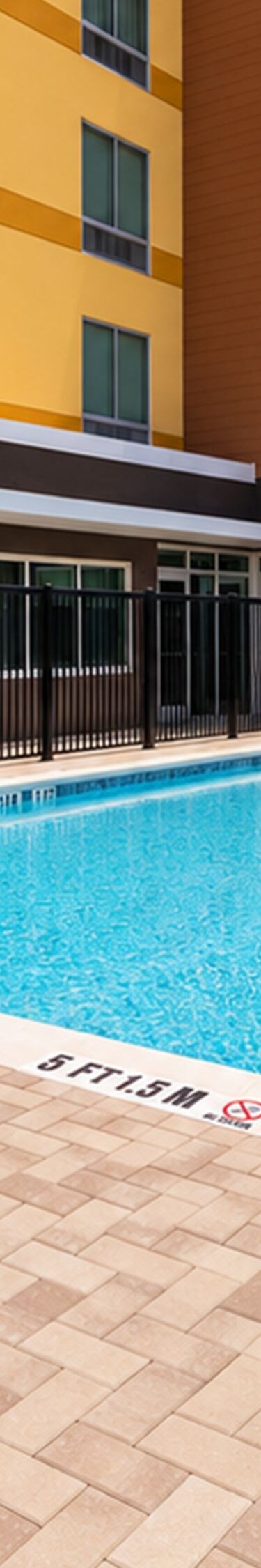 outdoor swimming pool and sun loungers