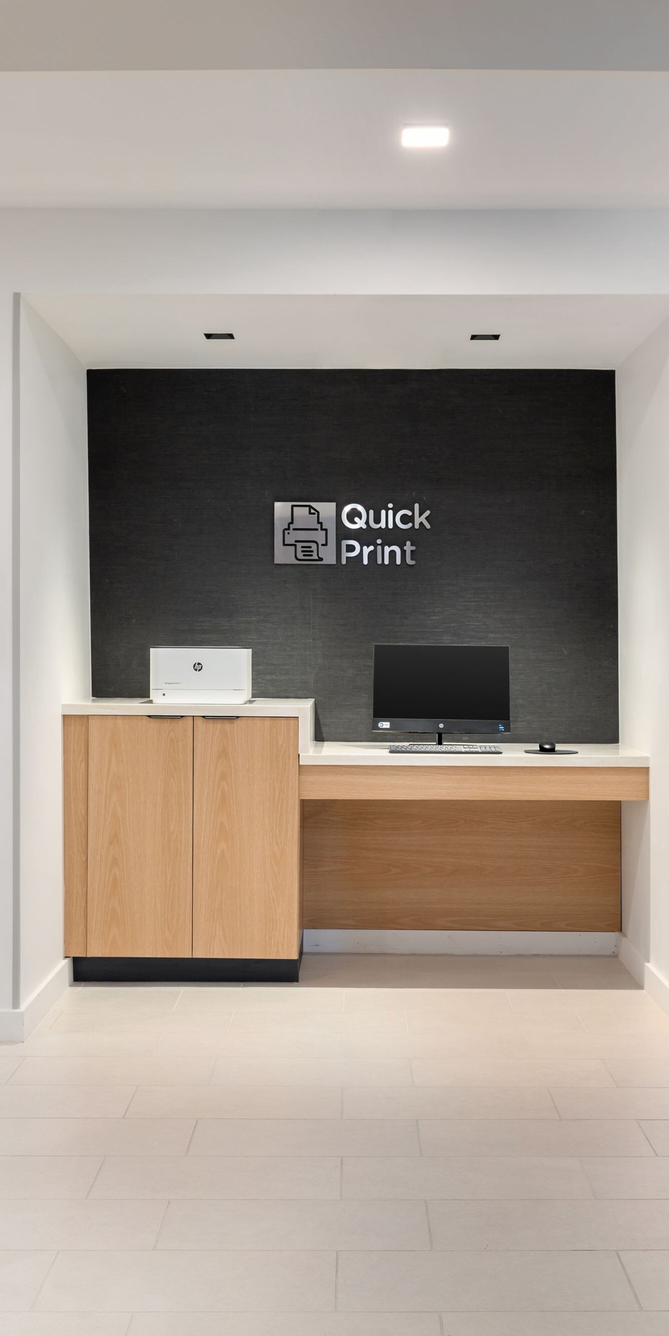 Computer monitor and printer in hall