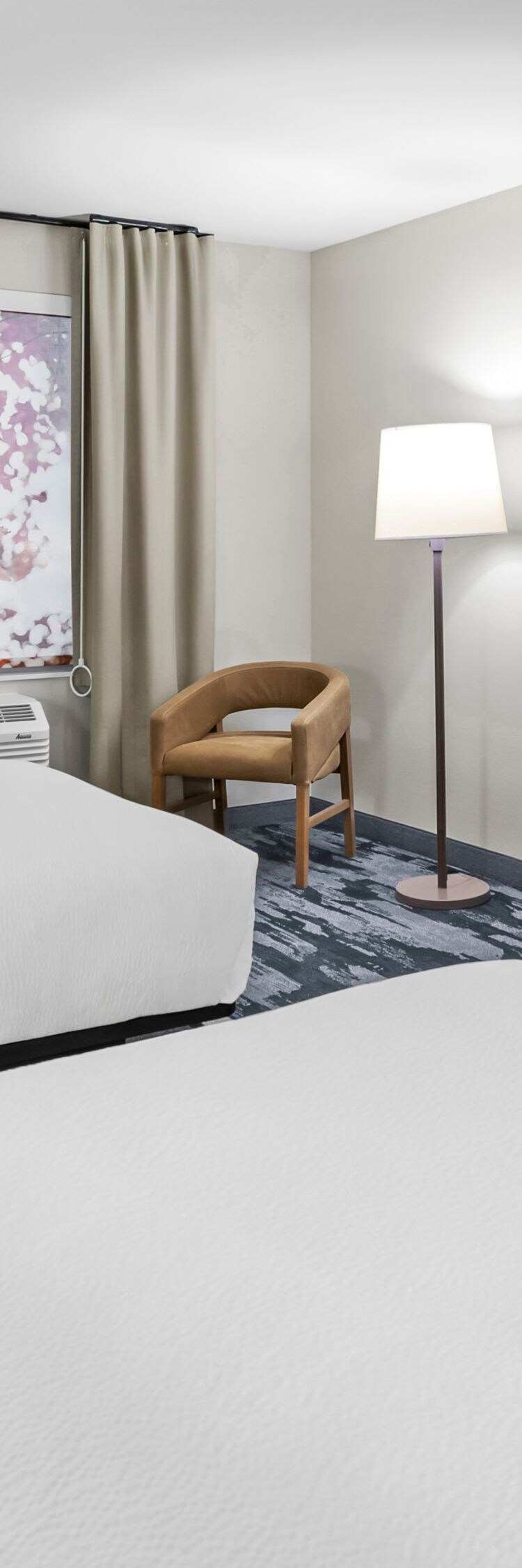 two beds, work des, tv, armchair, lamps