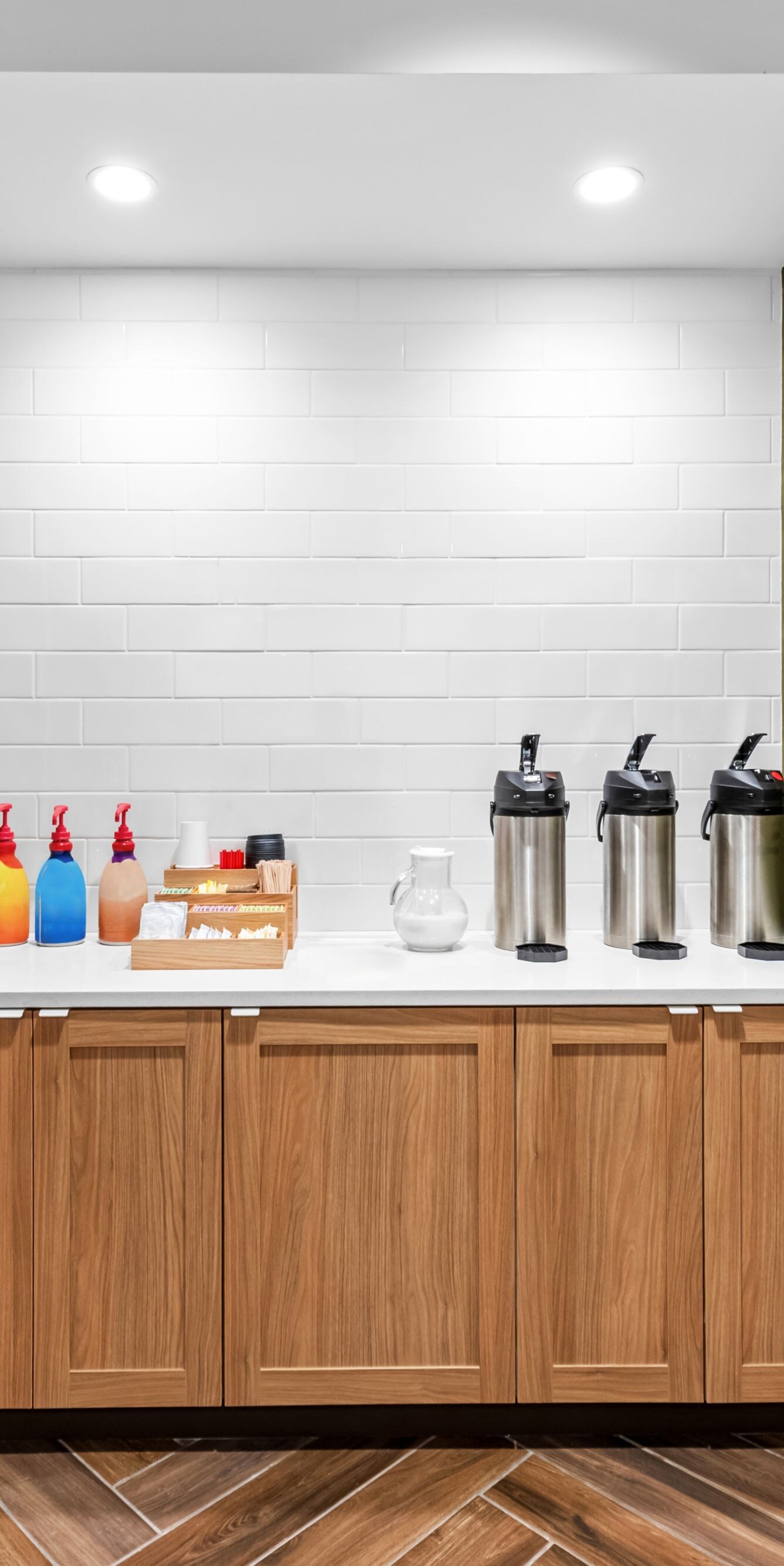 coffee station with carafes and creamers