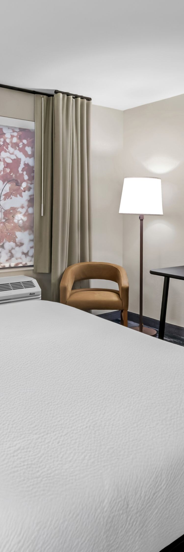king bed, work desk, luggage rack, armchair