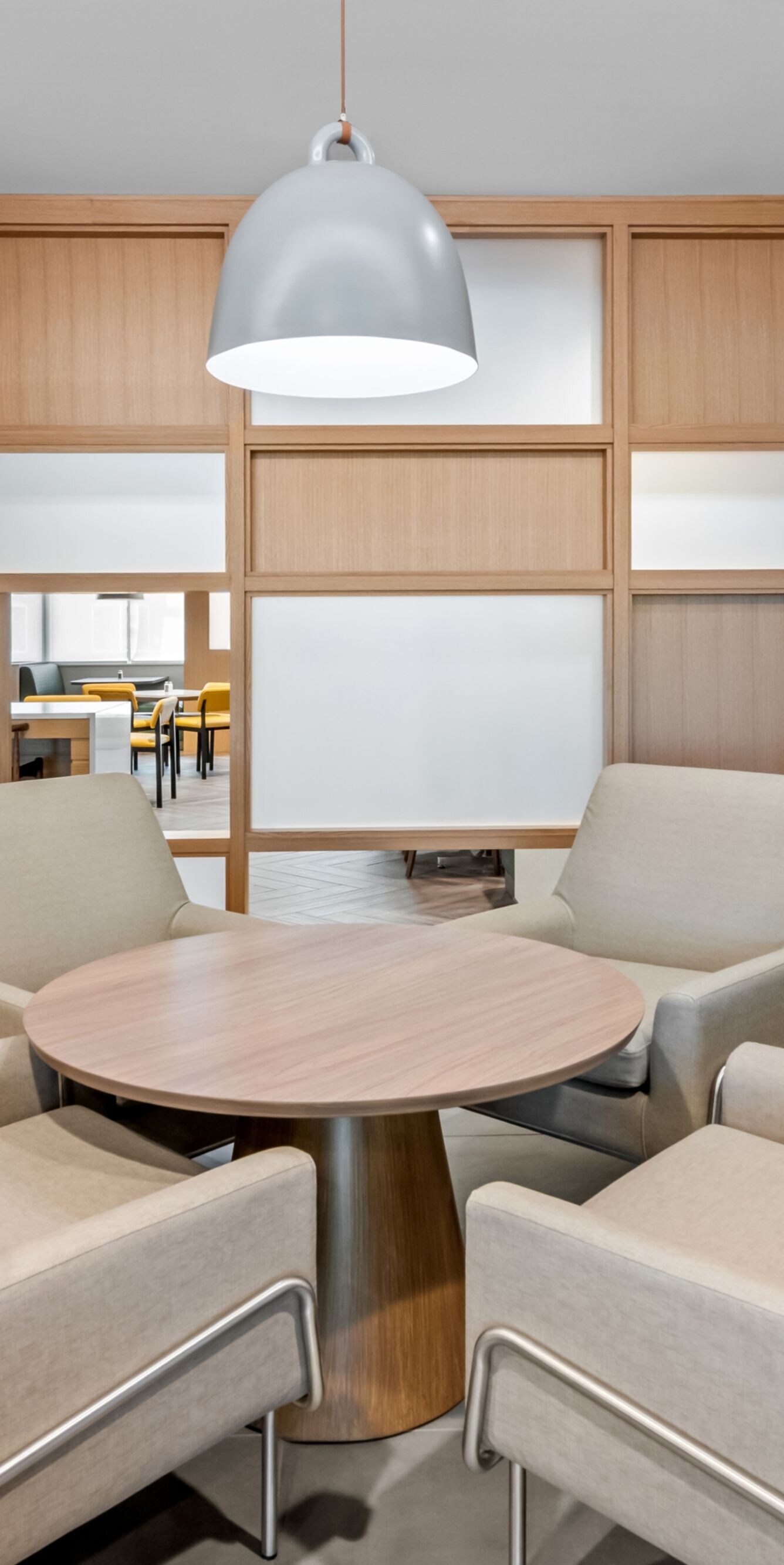 small nook in lobby with table and 4 chairs