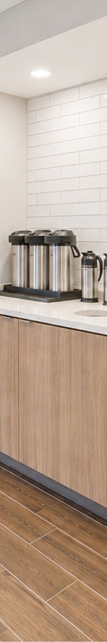 Coffee station and breakfast seating