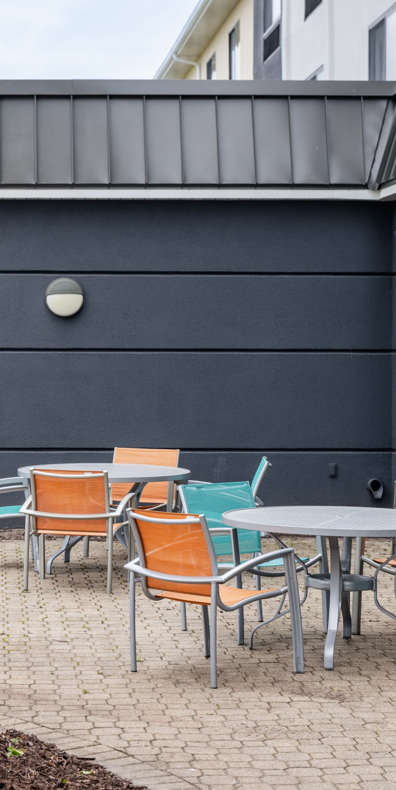 Outdoor patio adjacent to the pool area 