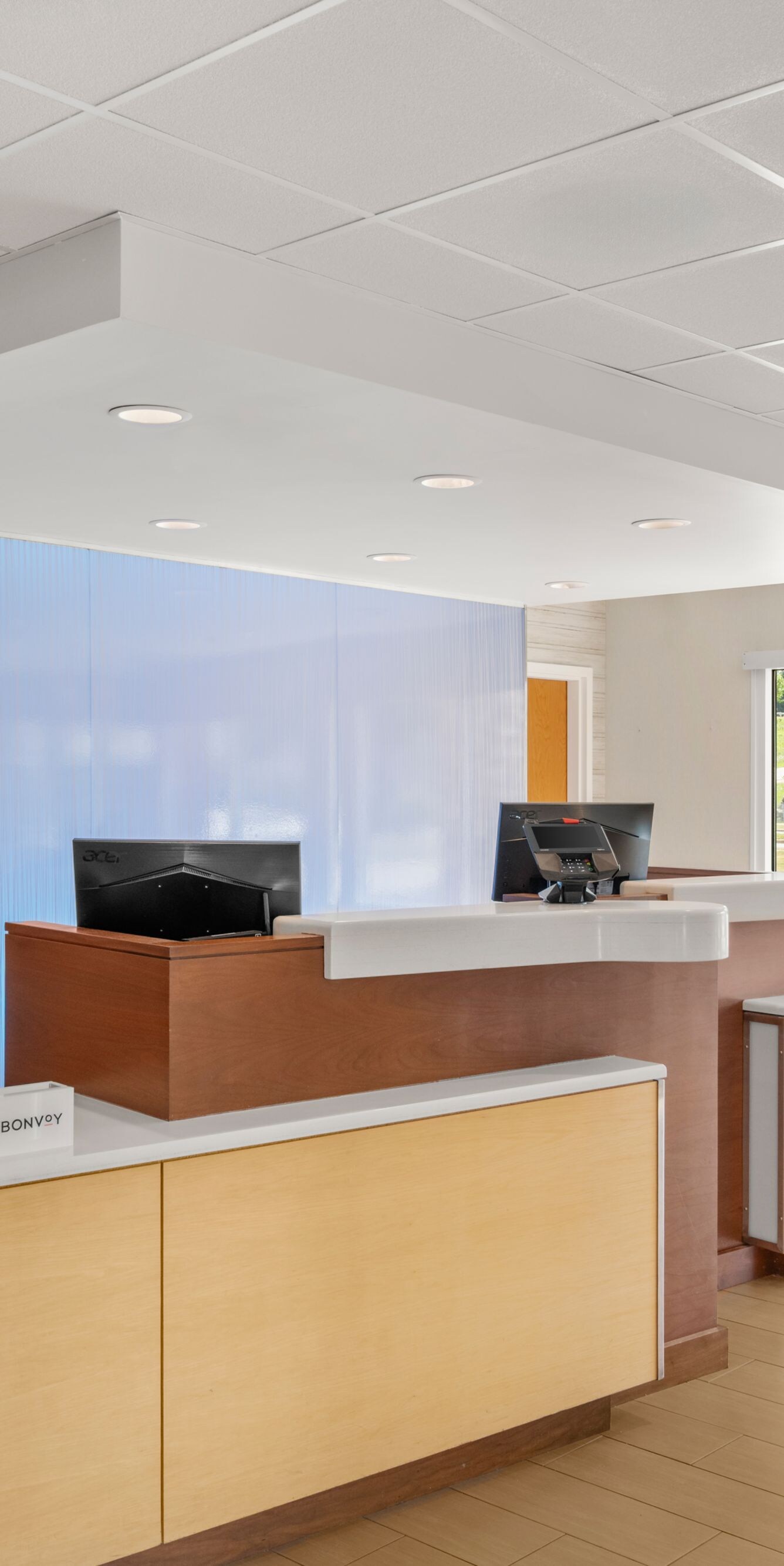 front desk with reception counters and windows