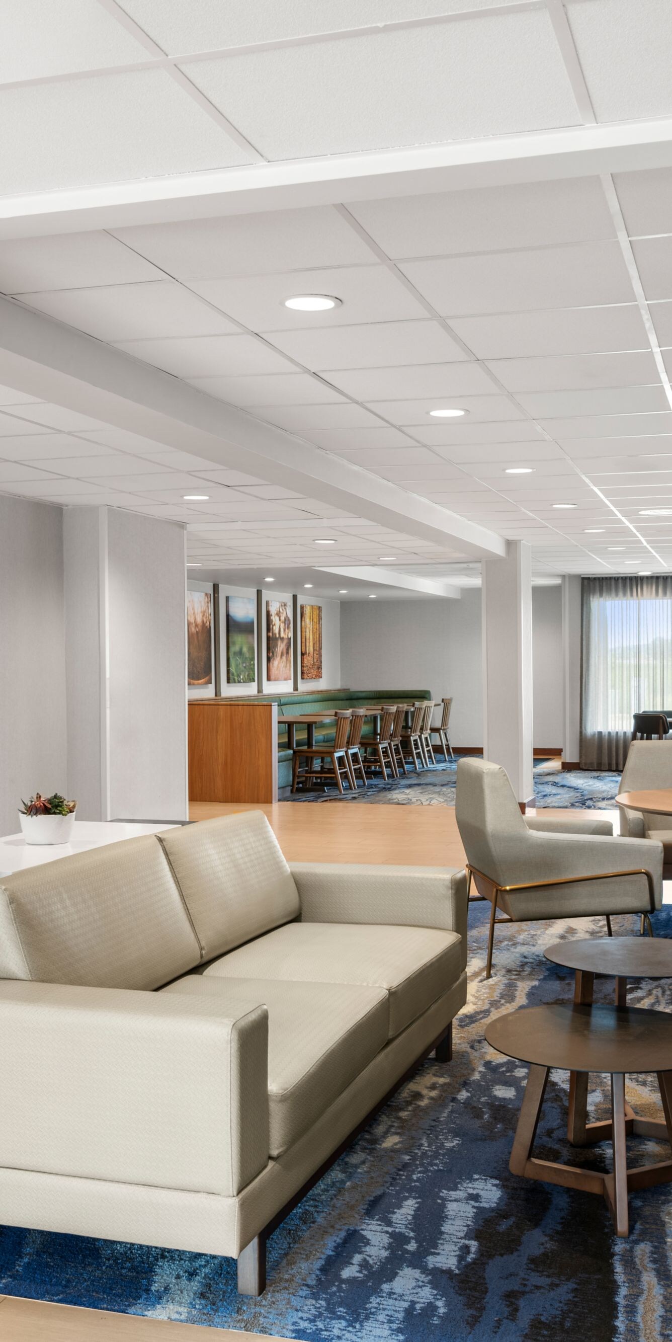 Lobby lounge with fireplace and seating area