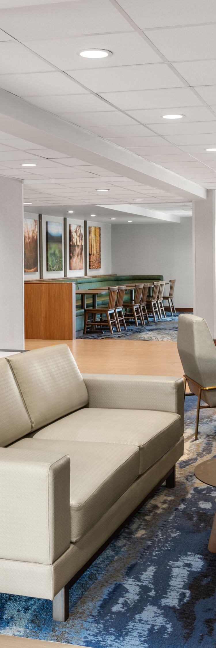 Lobby lounge with fireplace and seating area