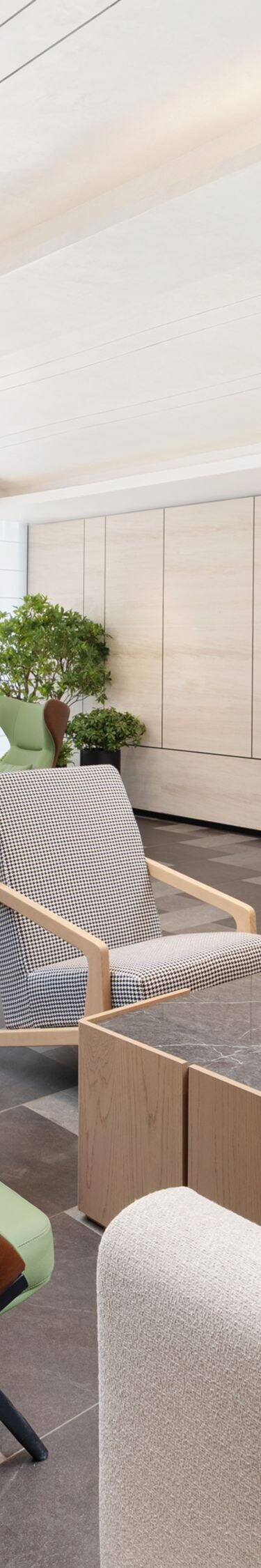 Spacious hotel lobby area with sofas and seating