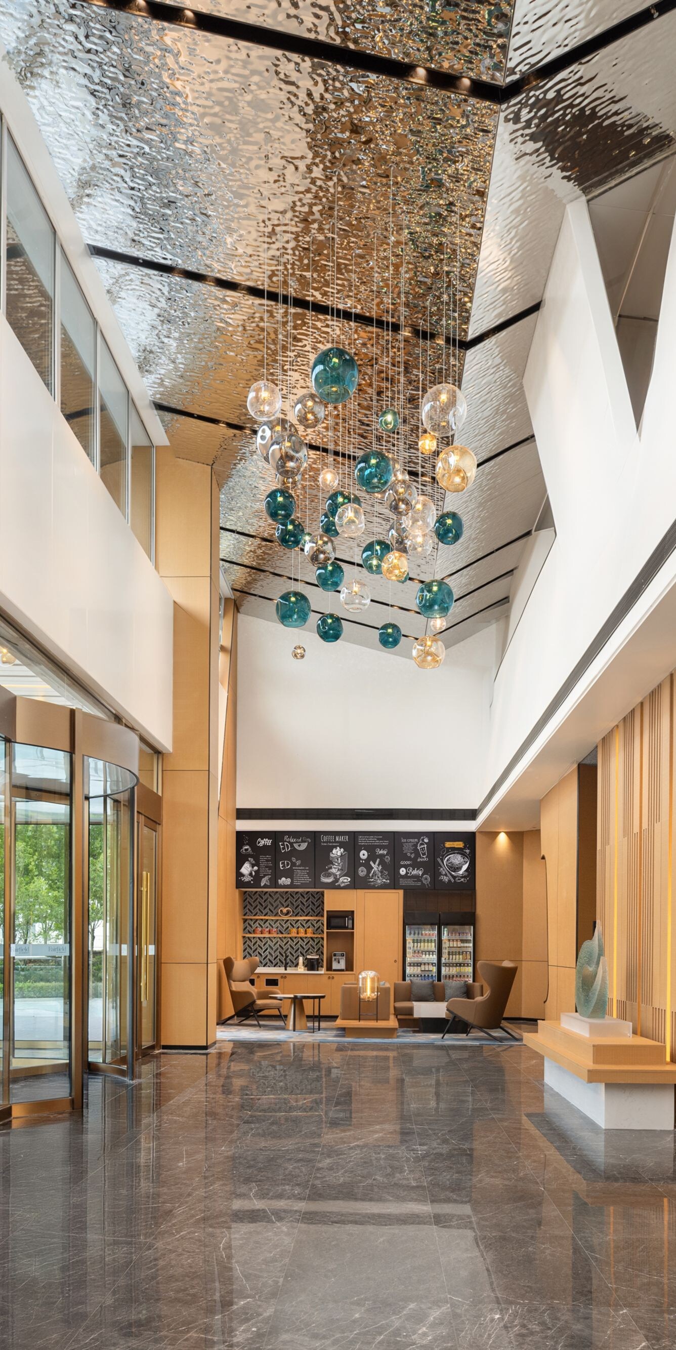 Large lobby space with front desk at the end