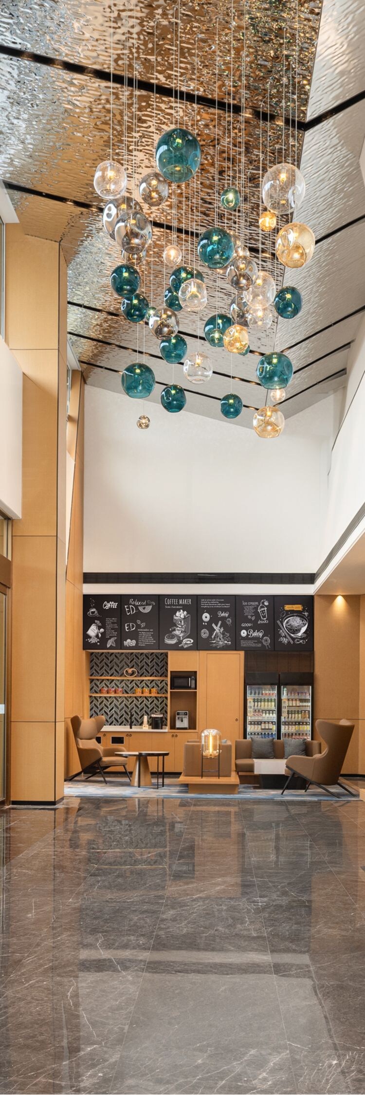 Large lobby space with front desk at the end