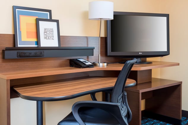 in-room desk, desk chair and tv