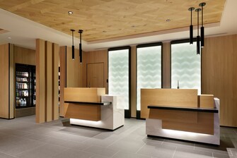 Hotel front desk with 2 check-in counters