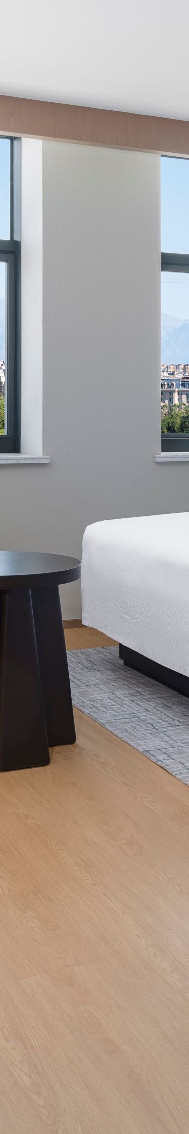 Spacious two queen bed guest room with city view a
