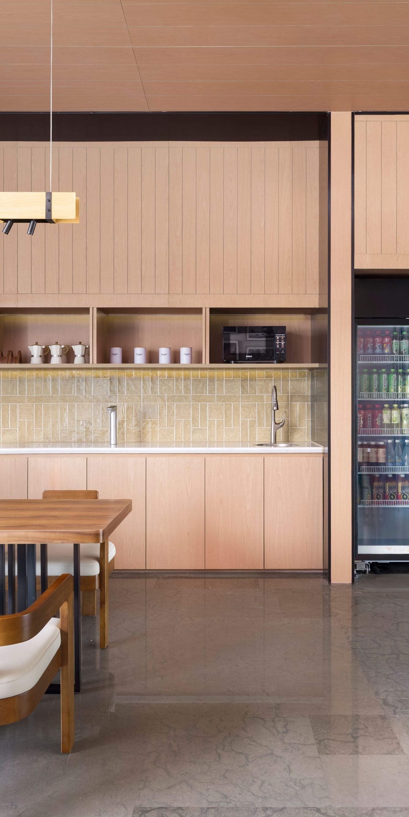 Hotel market area with dining table, beverage cool