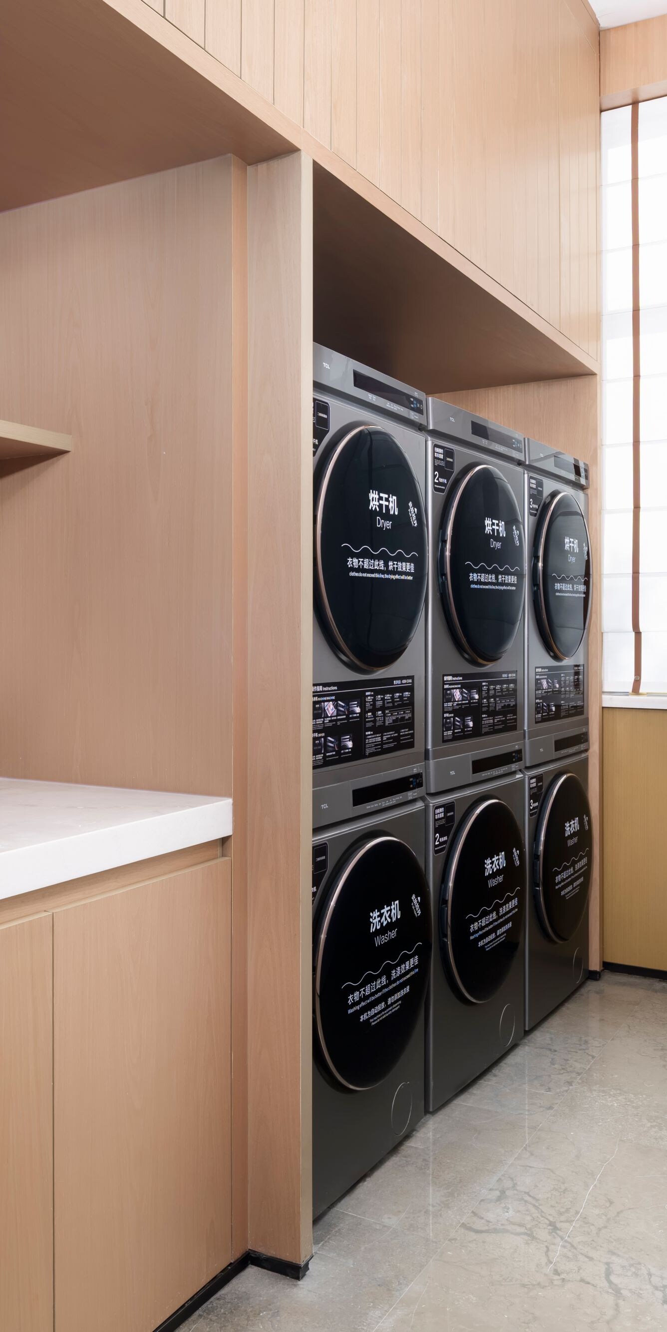 Laundry room with washers and dryers