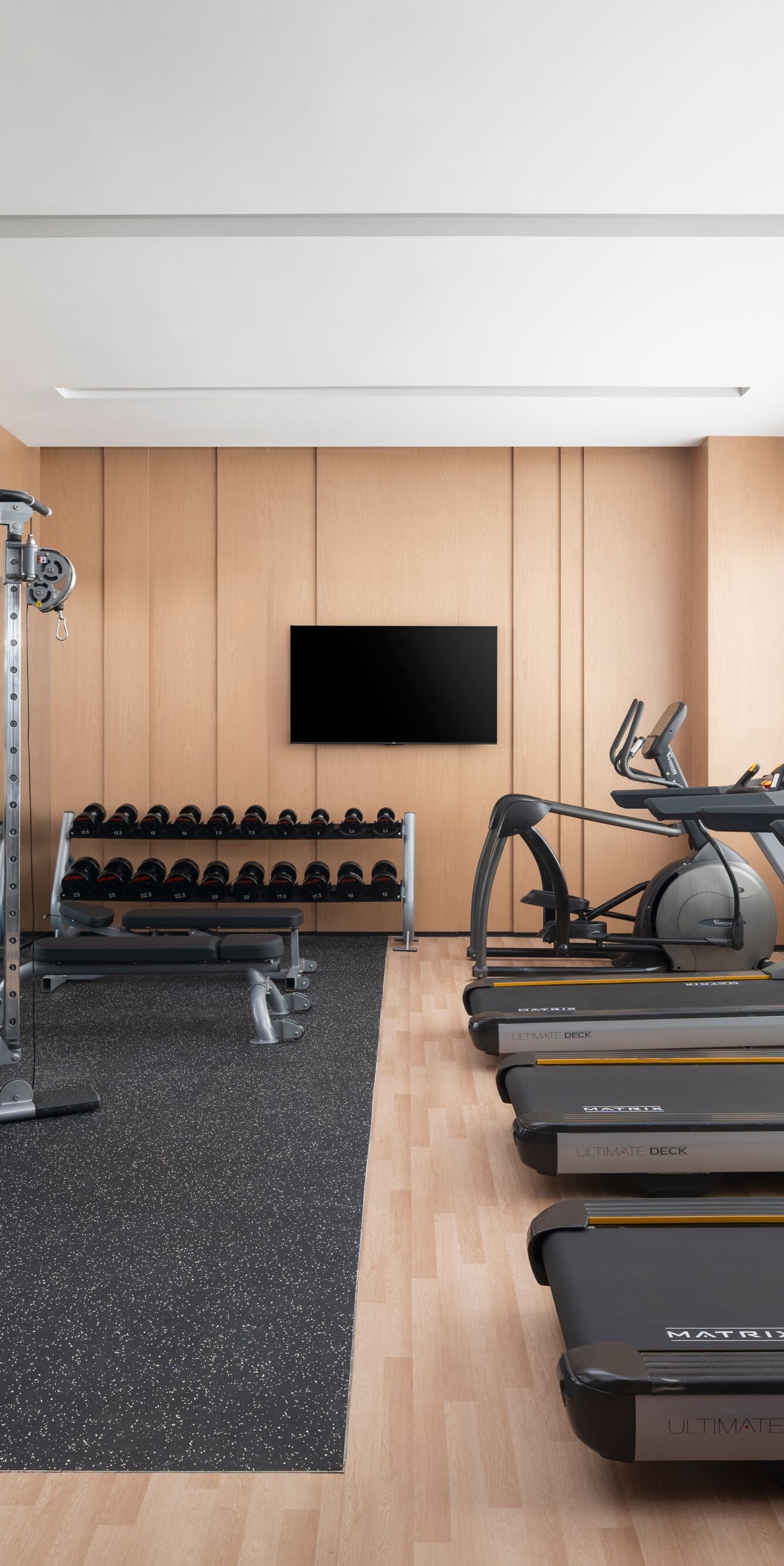 Fitness center with treadmills and weights