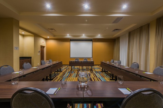 Hotel meeting room with U-shape table setup