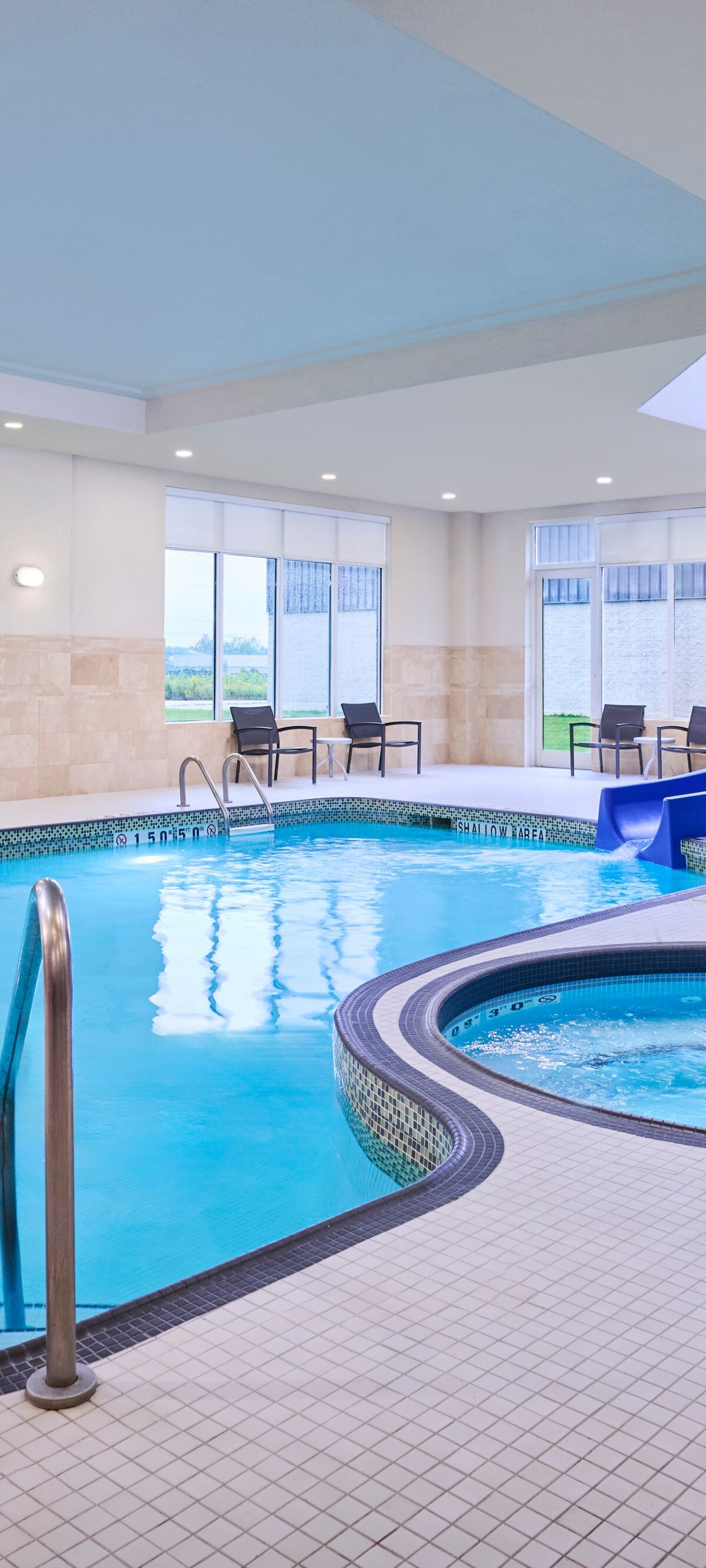 Pool area with spa and waterslide