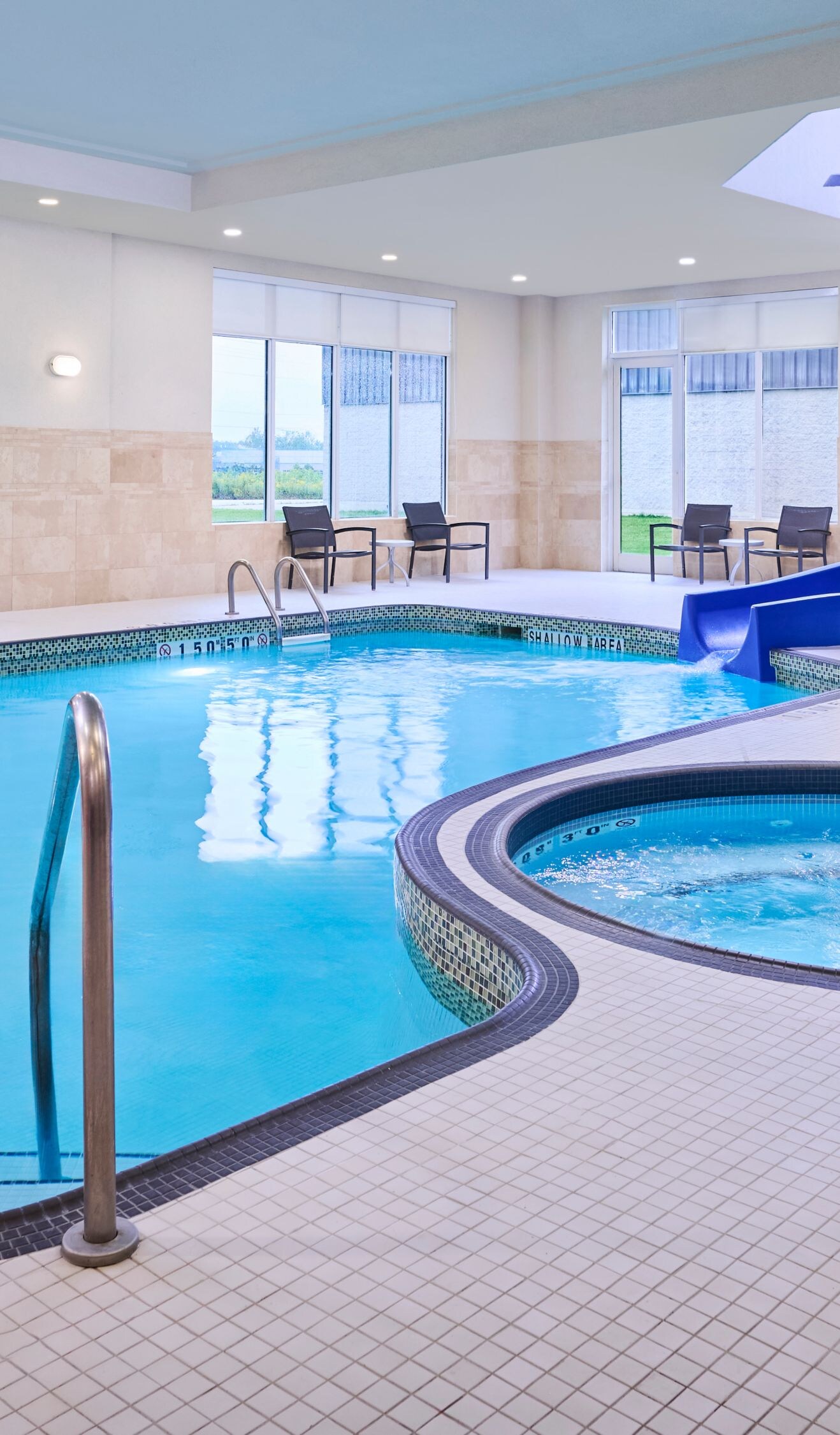 Pool area with spa and waterslide