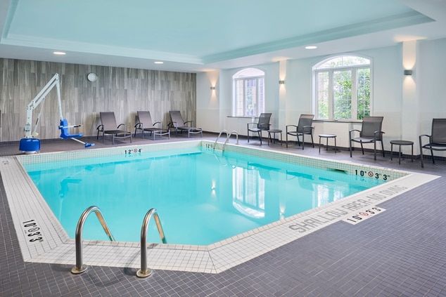 Accessible Indoor Pool with pool lounge chairs