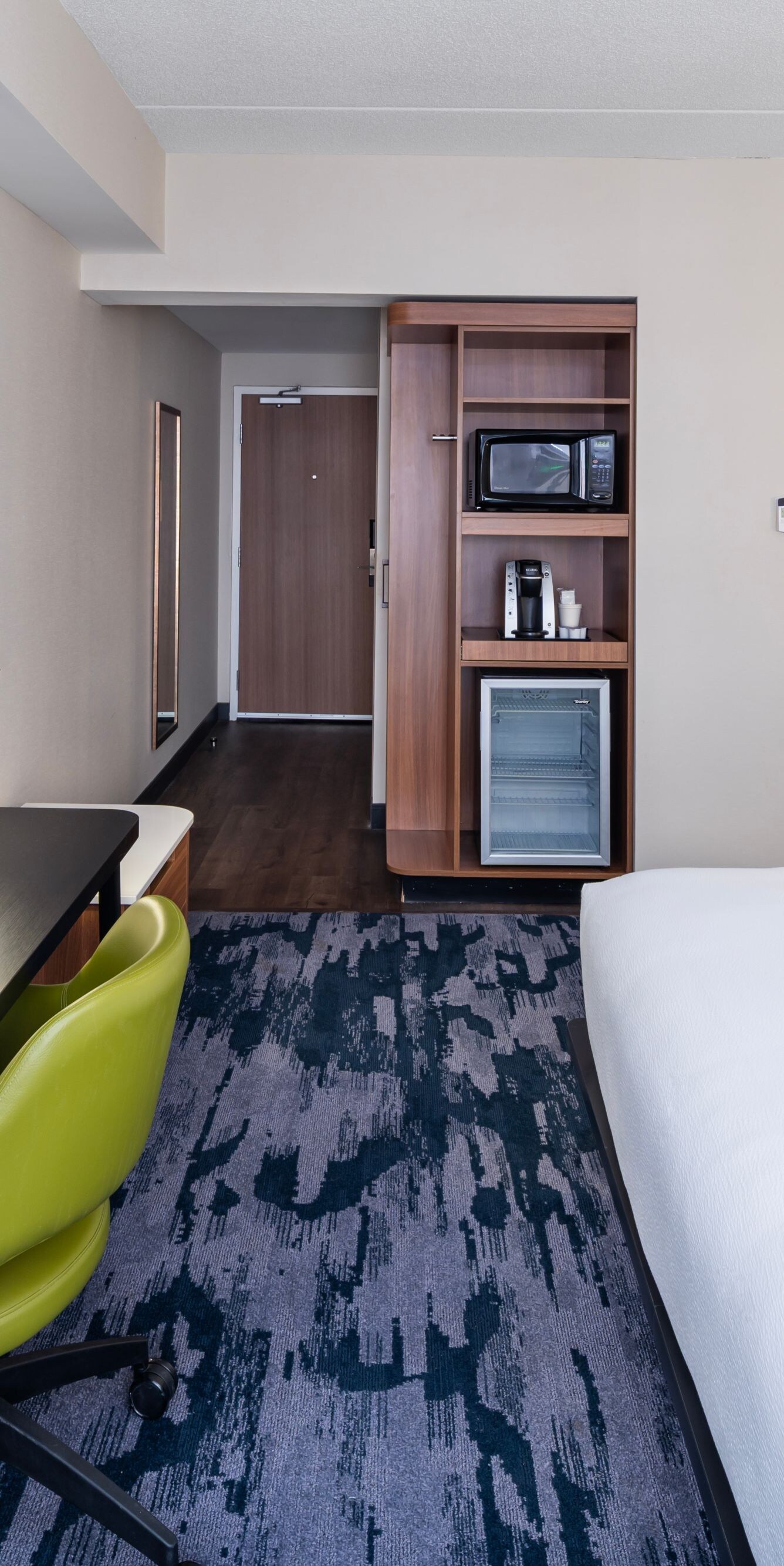 Guest room with king bed and work desk
