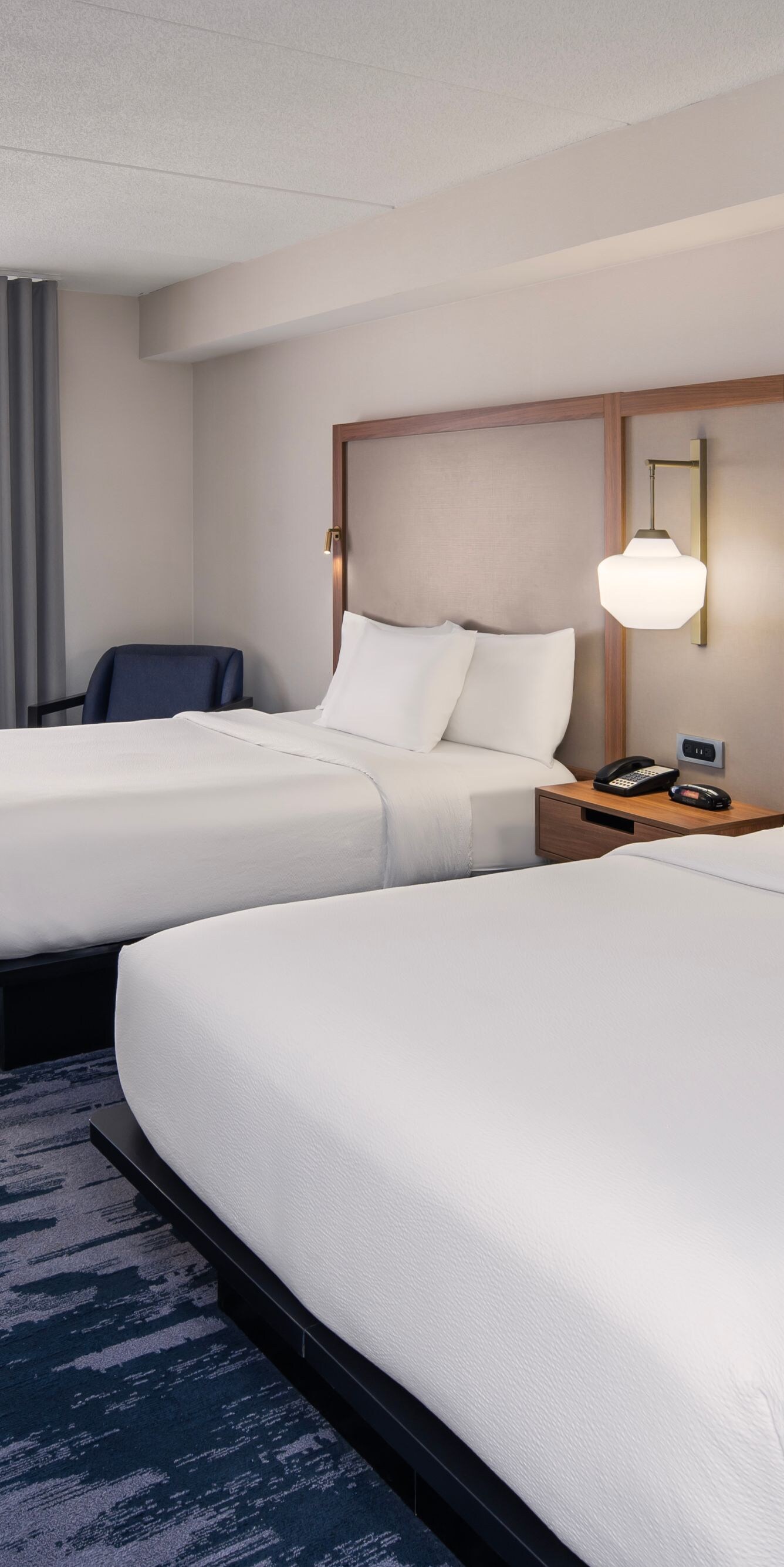 Double queen guest room with work desk