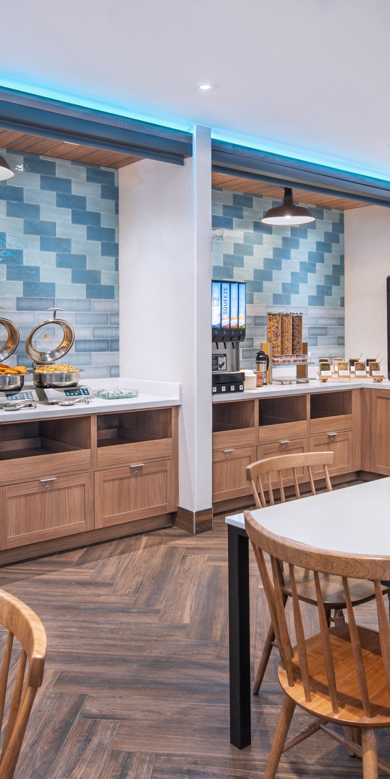 Breakfast buffet area with dining tables