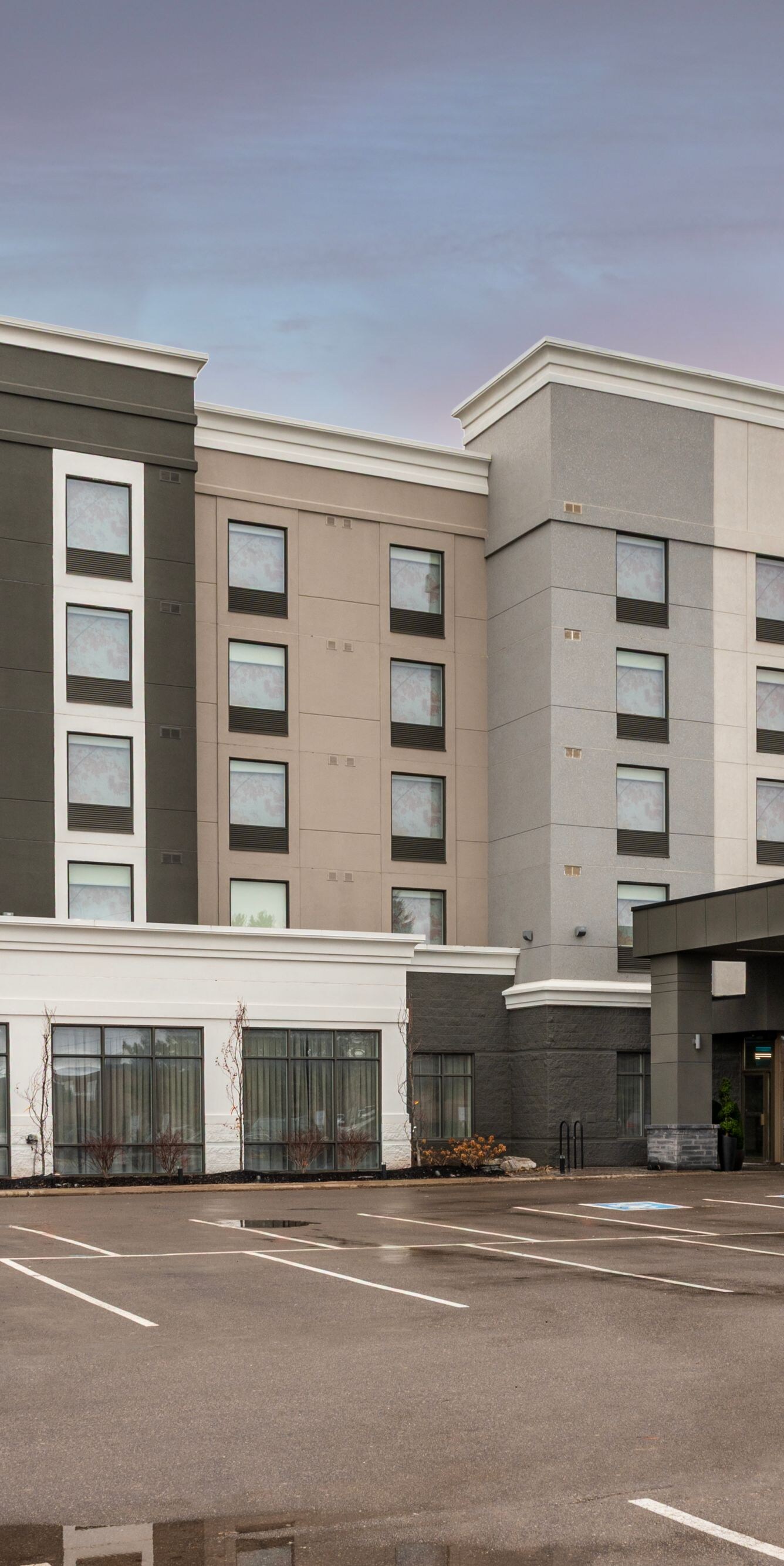 Exterior view of building with parking