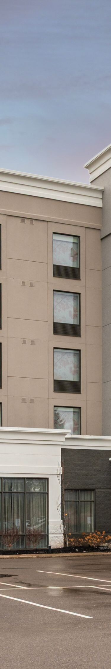 Exterior view of building with parking