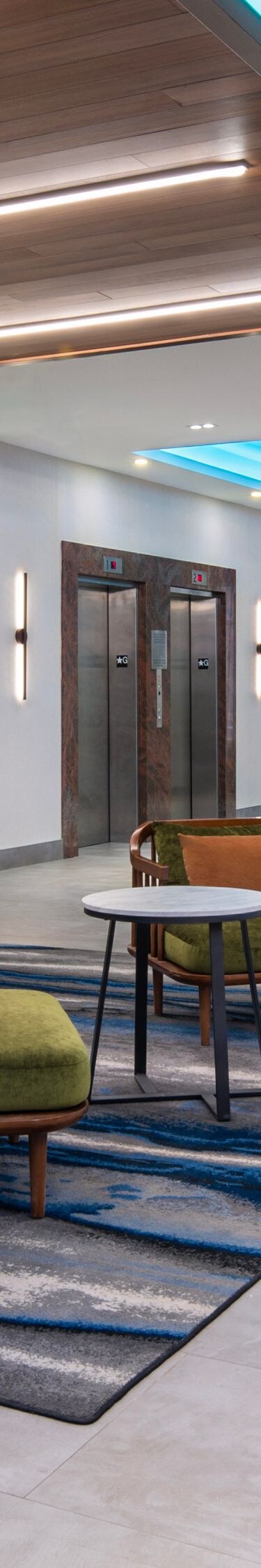 Lobby with stone wall and blue lighting