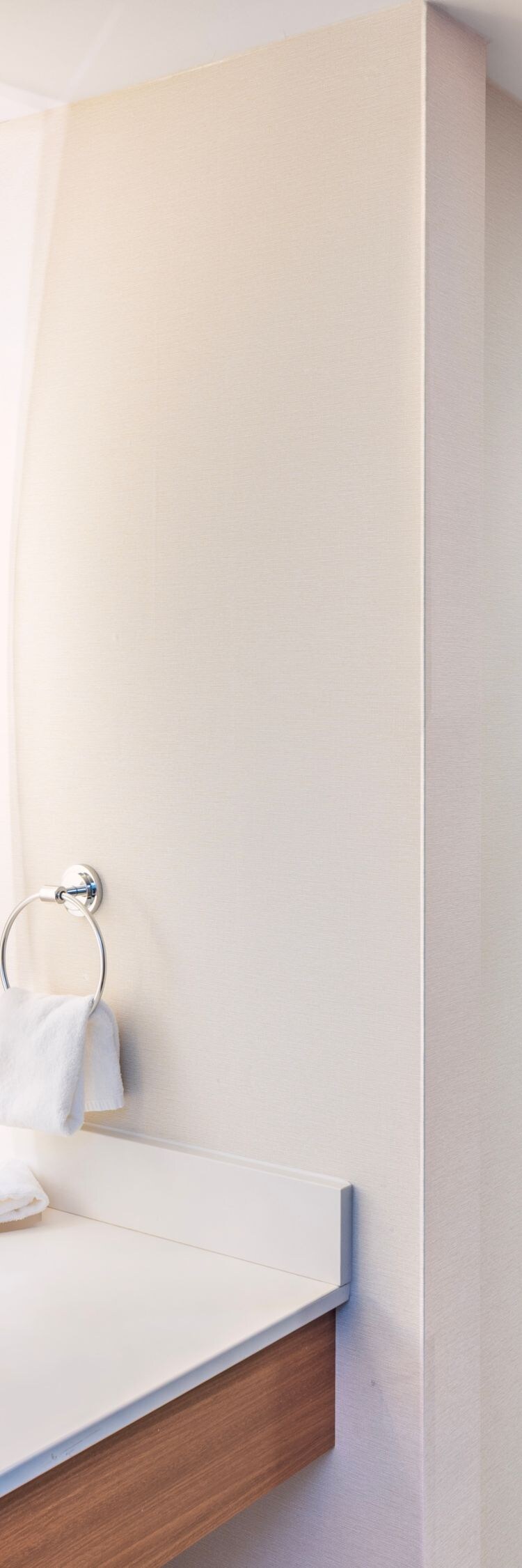 Modern bathroom with backlit mirror