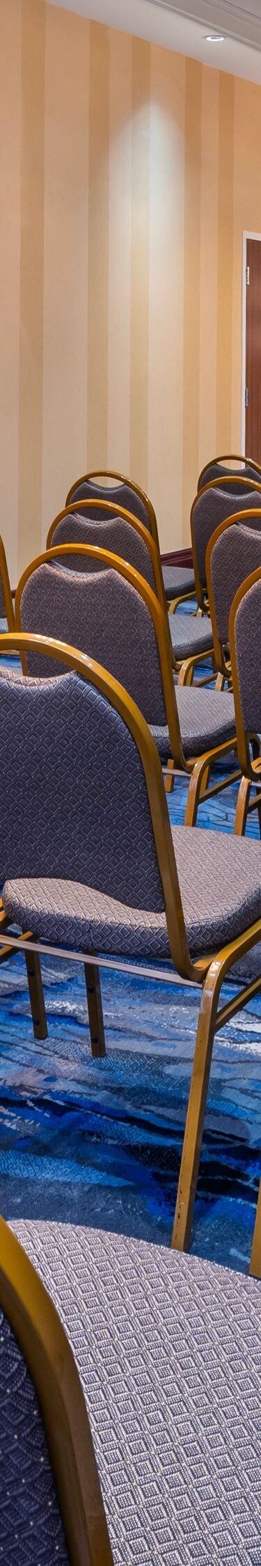 Meeting room with theater seating and screen