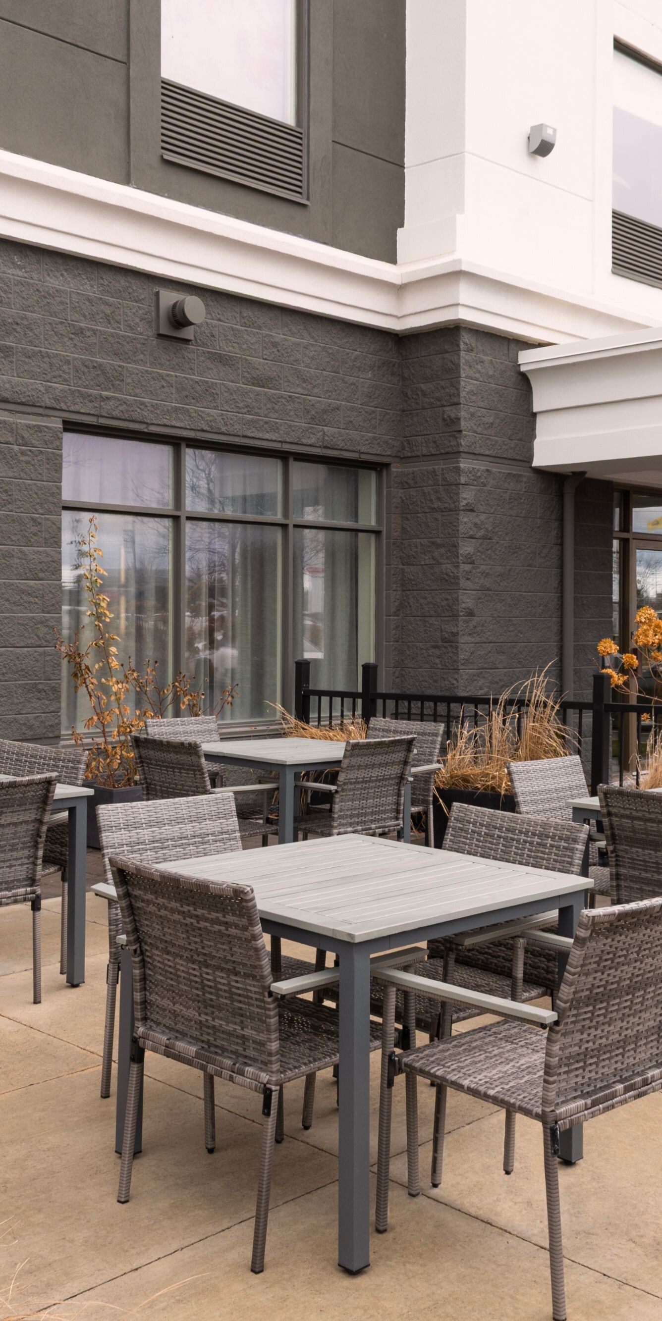 Outdoor patio with tables and chairs